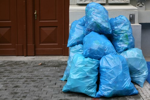 Person filling out a skip permit application in Sydenham